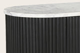 Close-up of the Arpino white marble top over the rounded, reeded end in black