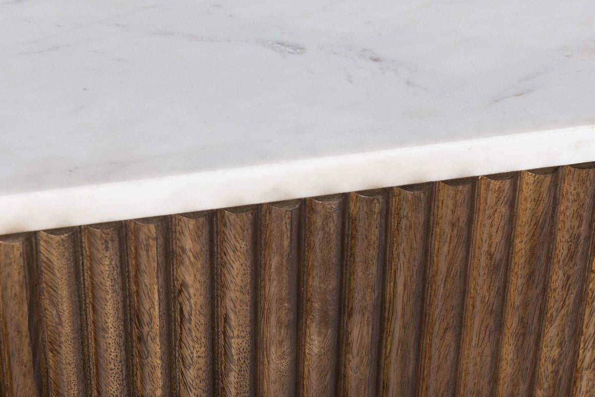 Close-up of the Arpino white marble top over the reeded mango wood case in walnut