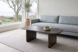 Arquata coffee table in mocha in front of a blue-grey linen sofa in an Oak Bay, Victoria living room, green pears in a white bowl