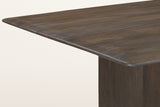 Close-up of the Arquata top in mocha: a rounded corner, the softened edge and the mango grain