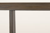 Close-up of one Arquata slab leg in mocha mango wood meeting the edge of the top