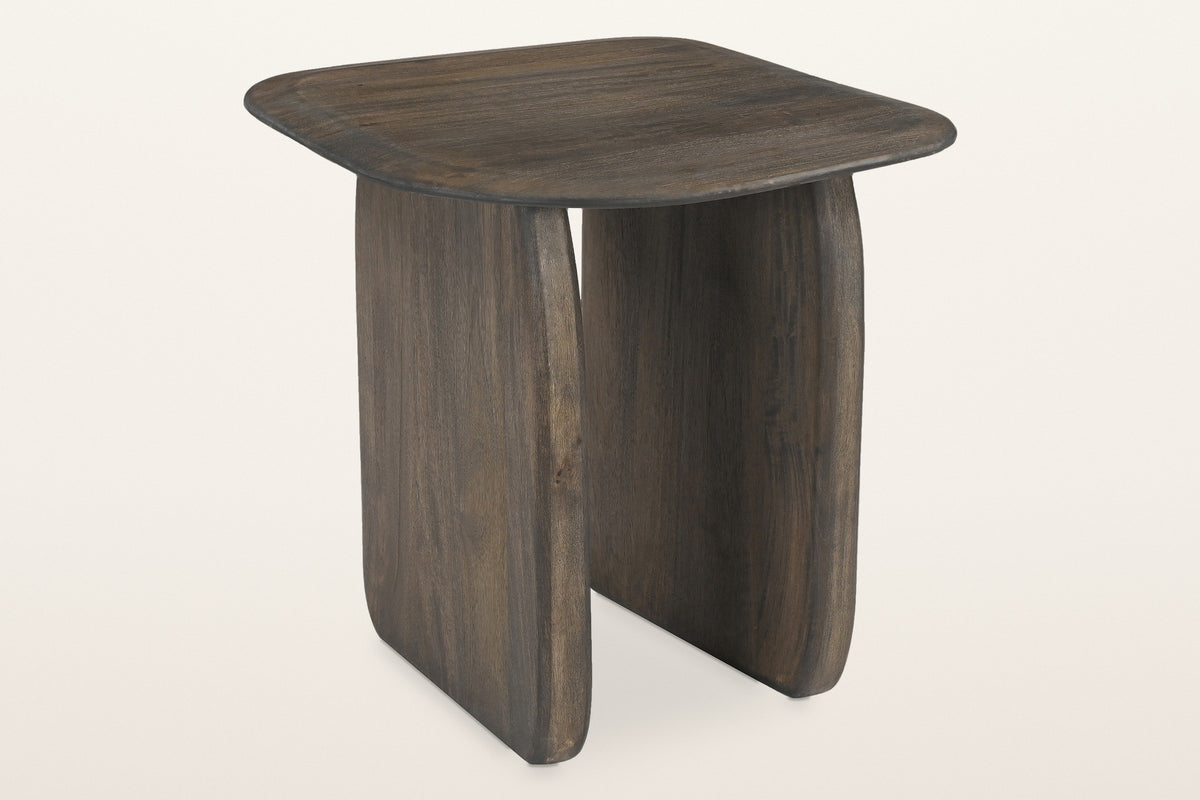 Arquata organic mango wood side table in mocha, three-quarter view on a warm white studio backdrop