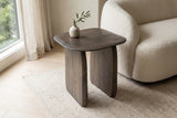 Arquata side table in mocha beside a cream boucle sofa in a Vancouver living room