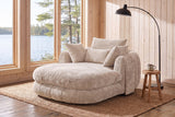 Asolo chaise lounge in Beige chenille in the reading corner of a Muskoka cottage, by a window onto the lake