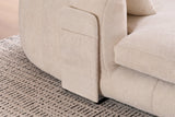 Close-up of the beige Asolo arm with its side pocket and the black metal sled leg at the floor