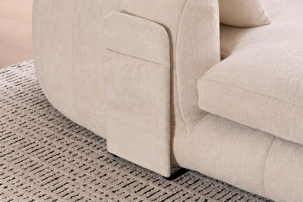 Close-up of the beige Asolo arm with its side pocket and the black metal sled leg at the floor