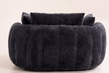 The back of the Asolo chaise lounge, channel-tufted all the way round