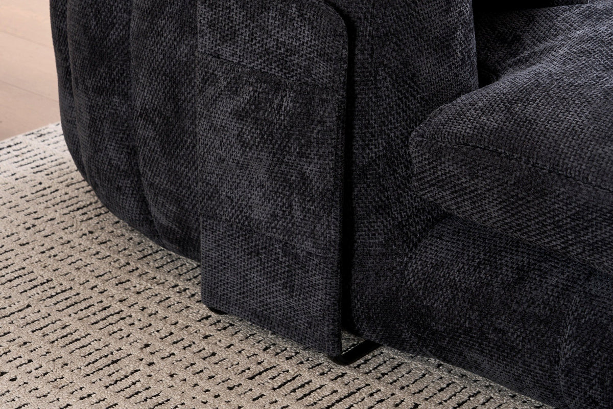 Close-up of the Asolo arm with its side pocket and the black metal sled leg at the floor
