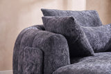 Close-up of the Grey chenille on the Asolo arm, its side pocket and the pillows