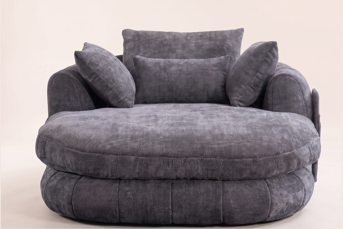 Asolo chaise lounge in Grey chenille, front view: the oval seat cushion, the channelled base and four pillows