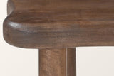 Close-up of the Atri: the thick rounded edge of the top and two round post legs meeting its underside