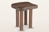 Atri freeform mango wood side table in dark walnut, three-quarter view on a warm white studio backdrop
