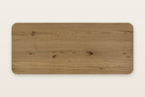 The Atzara top seen from above in Natural: long oak planks with knots, and four rounded corners
