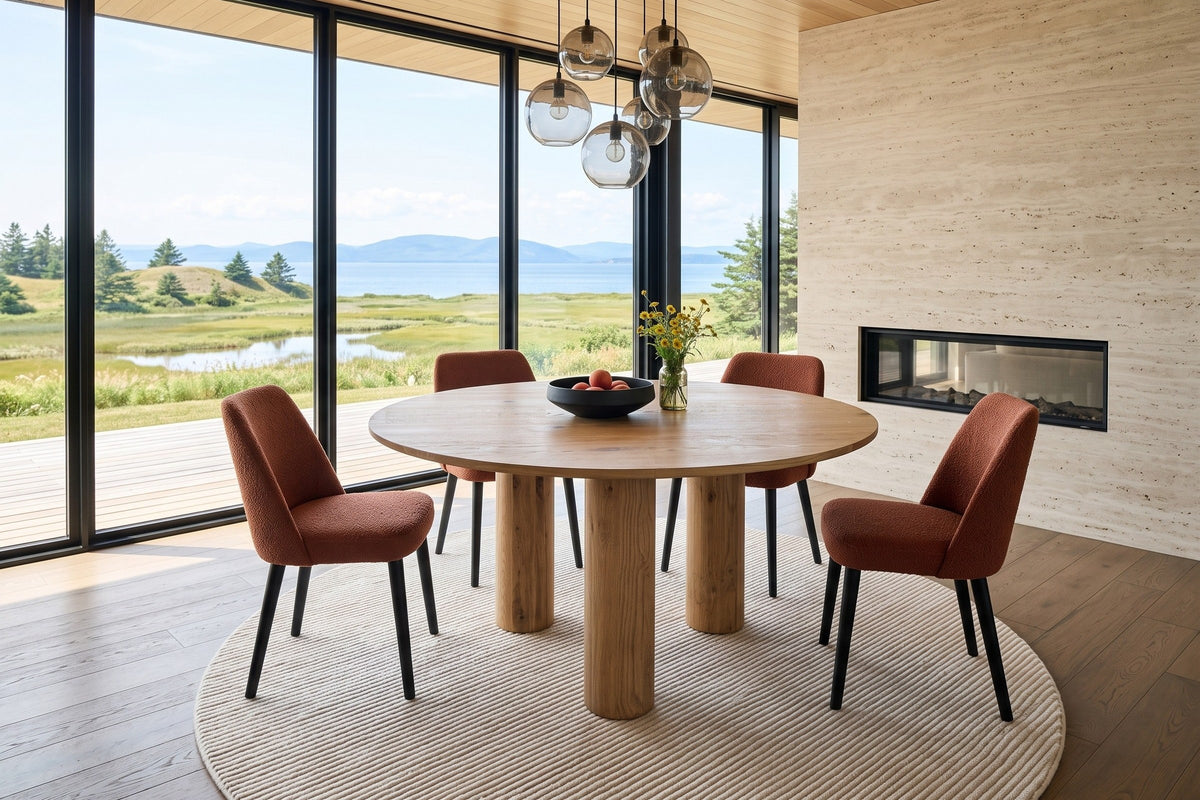 Atzara round dining table in a Kamouraska house on the St. Lawrence estuary