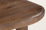 Close-up of the Bagnoregio top: the fully rounded edge of the solid mango slab, dark walnut finish
