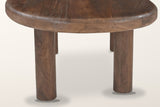 Close-up of the Bagnoregio base: round solid mango post legs meeting the underside of the rounded slab