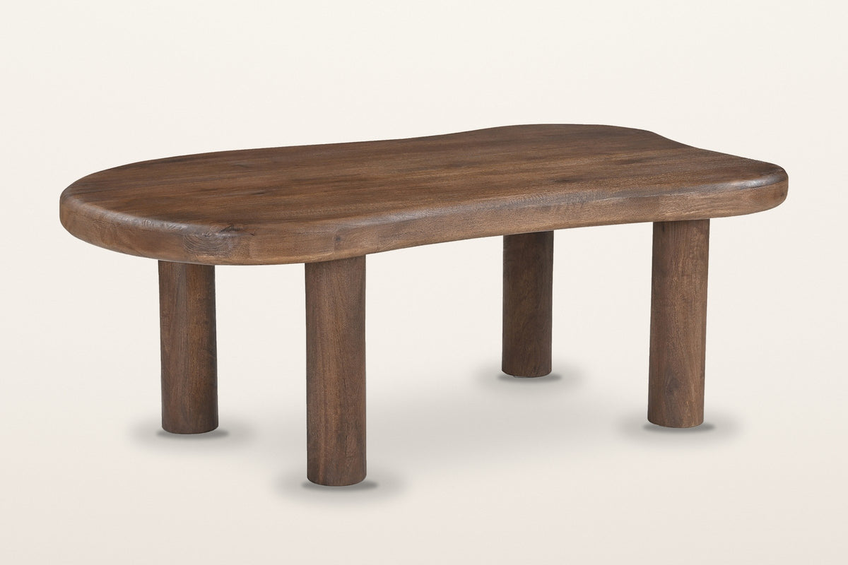 Bagnoregio freeform mango wood coffee table in dark walnut, three-quarter view on a warm white studio backdrop