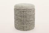 Balme round storage pouf in Charcoal on a warm white studio backdrop: a square waffle-knit drum with a domed knitted lid
