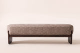 Bassano bench in light brown boucle, straight front view on a studio backdrop
