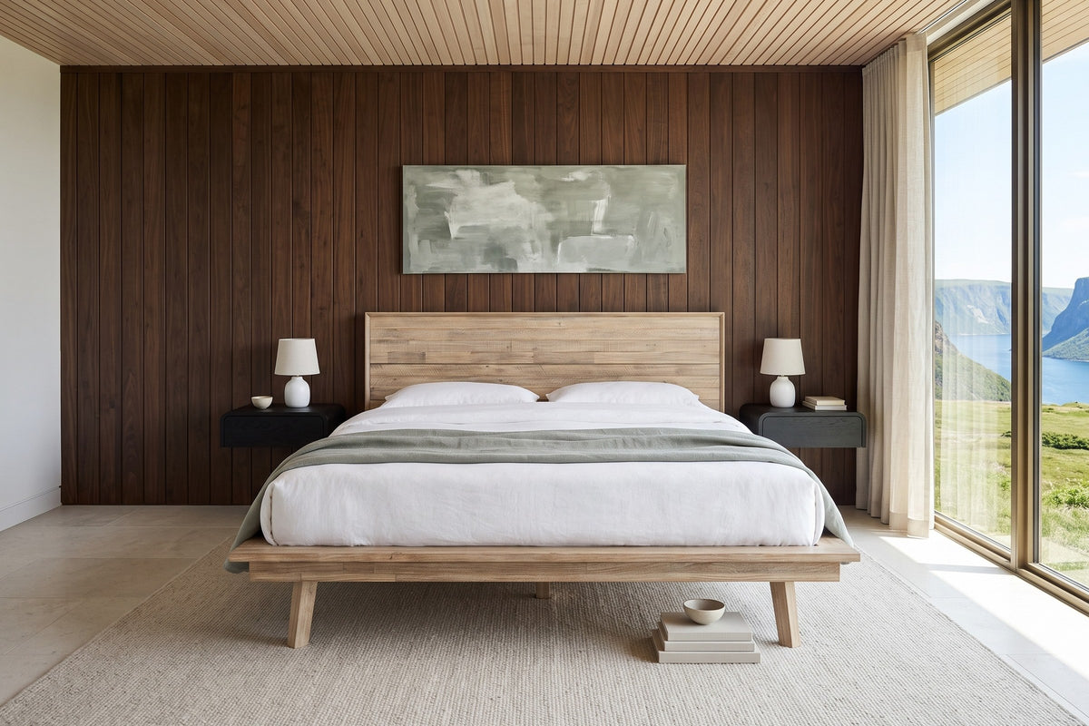 Front view of the Bassiano bed in Light Driftwood in a bedroom in a Gros Morne fjord house, with dark walnut panelling