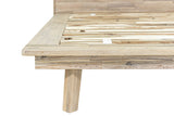 Close-up of a Bassiano rim corner in Light Driftwood: the wide rim over the recessed apron and a square tapered leg