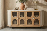 Bellamy sideboard styled with a terracotta vase and books against a plaster wall