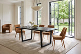 Bernalda dining table in Black in a Westmount stone house, with white panel mouldings