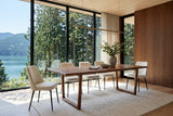 Bernalda dining table in Honey Brown in a Sechelt Inlet house, with walnut panelling, a cedar ceiling
