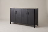 Bibbiena farmhouse 4-door sideboard in black, three-quarter view on a warm grey studio backdrop