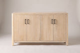 Bibbiena sideboard in Natural, straight front view: four doors in two pairs, four slim black pulls, rounded corner posts