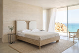 Bienno bed in a bedroom in a Lagos cliff villa in the Algarve, raised three-quarter view from the other side