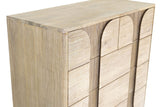 Close-up of the top corner of the Bienno chest in Sand Wash: the rounded front corner of the top, the side panel