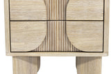 Close-up of the Bienno front in Sand Wash: the half-round drawer panels, the fine fluting between them