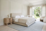 Bienno nightstand in Sand Wash beside an oatmeal bed in a Leaside garden house bedroom in Toronto