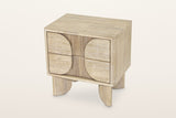 Bienno nightstand in Sand Wash seen from above on a warm white studio backdrop: the flat top with rounded corners over the tw