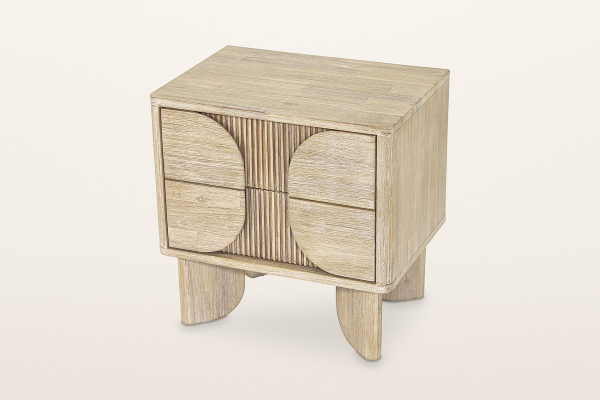 Bienno nightstand in Sand Wash seen from above on a warm white studio backdrop: the flat top with rounded corners over the tw