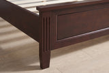 Close-up of the Bolsena footboard corner: a fluted post, the framed panel and a tapered square leg