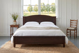 Bolsena panel bed under a wide window in a white board-and-batten farmhouse bedroom