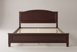 Bolsena arched panel bed in espresso, straight front view on a studio backdrop