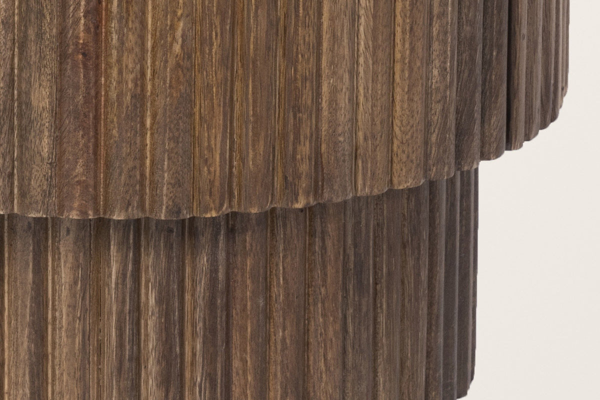 Close-up of the Bomarzo base in walnut: the reeded drum steps in to a narrower reeded plinth