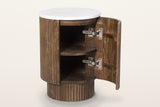 Bomarzo side table in walnut with its curved door open: one shelf inside the reeded drum