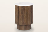 Bomarzo reeded mango wood side table in walnut with a white marble top, three-quarter view on a warm white studio backdrop