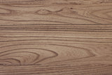 Close-up of the Bominaco wood in Brown: bold, wavy grain with small dark pin knots