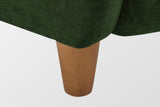 Close-up of a tapered solid birch leg in a teak finish under the velvet corner (Olive Green)