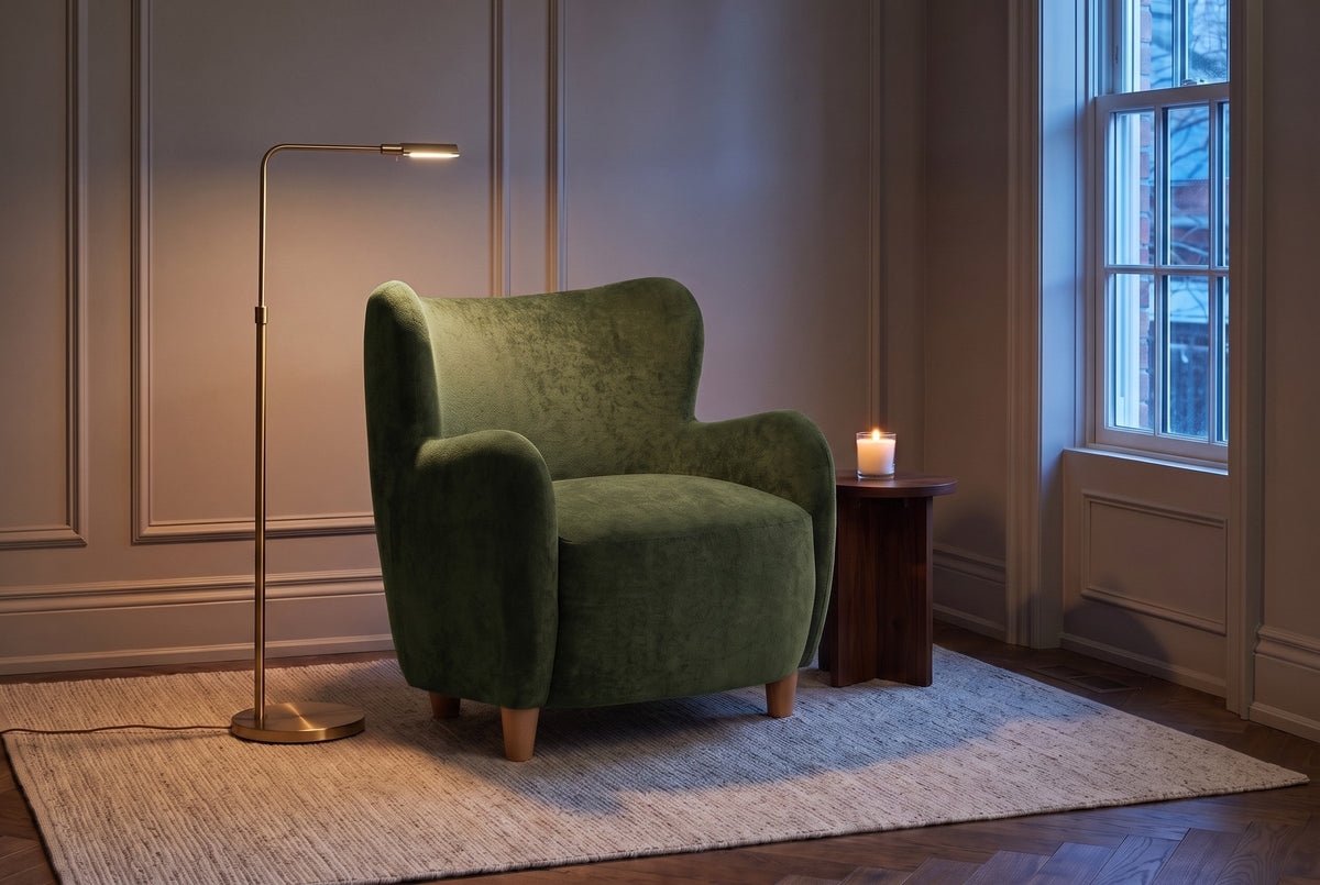 Bormio chair in a panelled townhouse reading corner at dusk