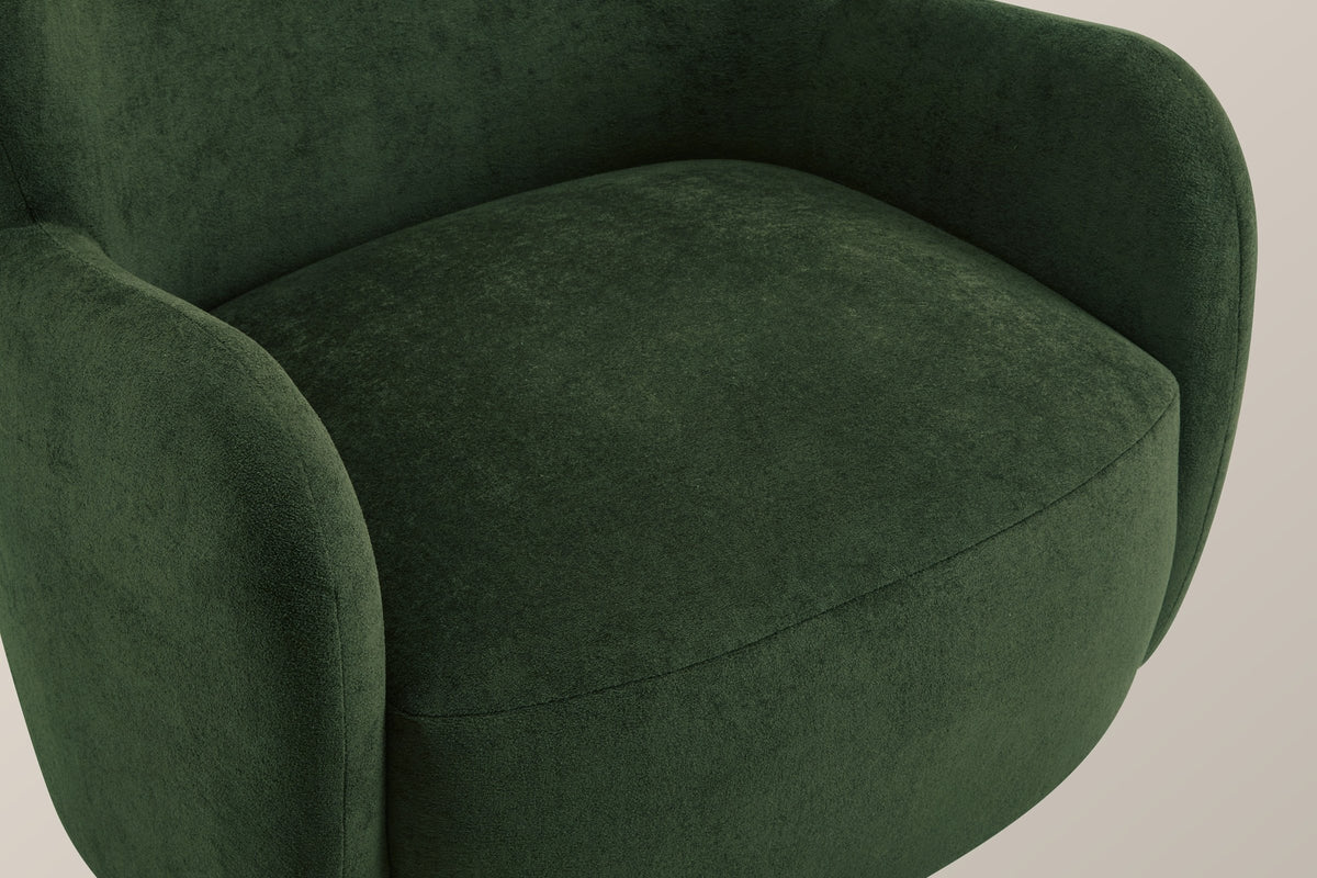 Close-up of the olive green velvet seat and arm, with the single seam along the front of the seat