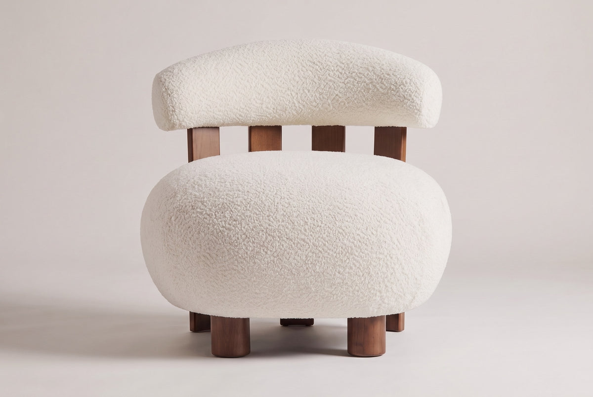 Brescia armless boucle accent chair in Off White, straight front view showing the four walnut slats and two round front legs