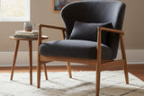 Briar Inkwell accent chair next to a round side table and a window