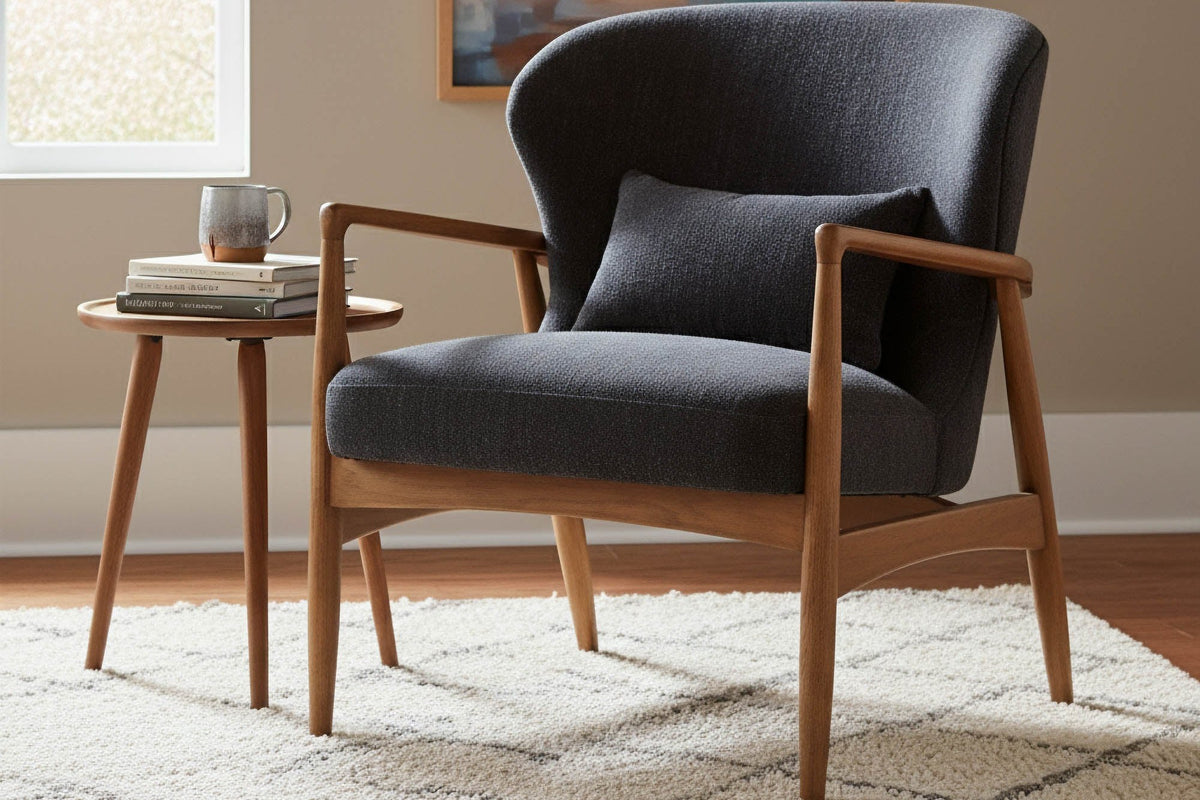 Briar Inkwell accent chair next to a round side table and a window