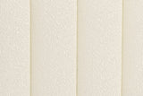 Close-up of the cream boucle: dense small loops in warm ivory